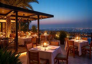 Outdoor terrace in the evening at Al Manzil